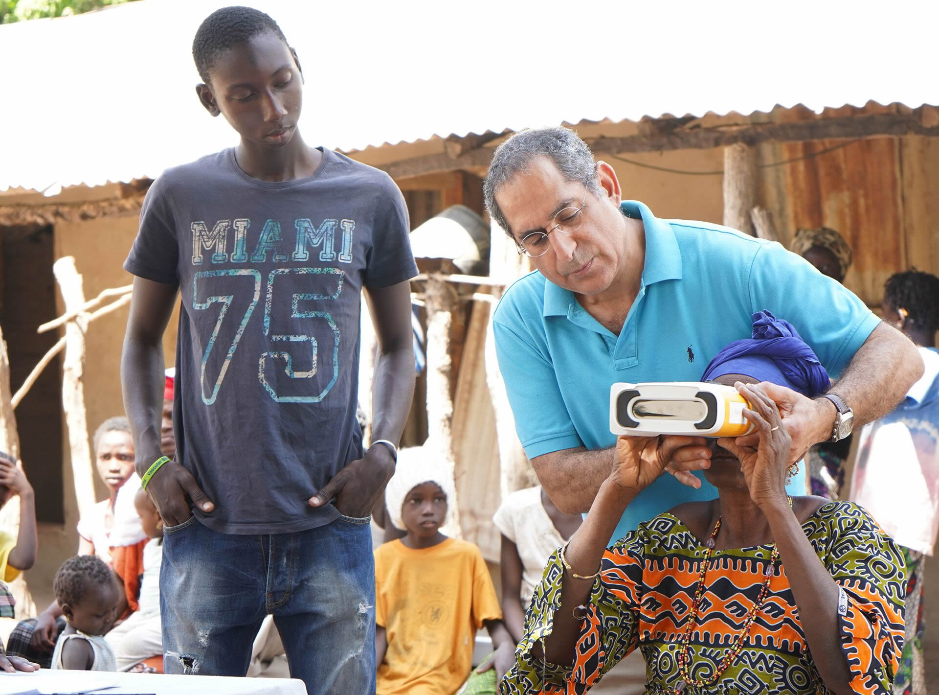twobillioneyes using the QuickSee handheld autorefractor in Gambia