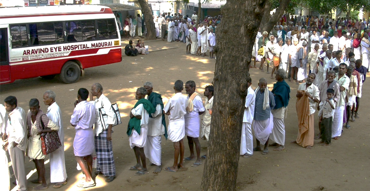 Long line of people waiting for eye screening in India