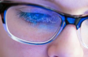 Closeup of chart reflection on eyeglass lens