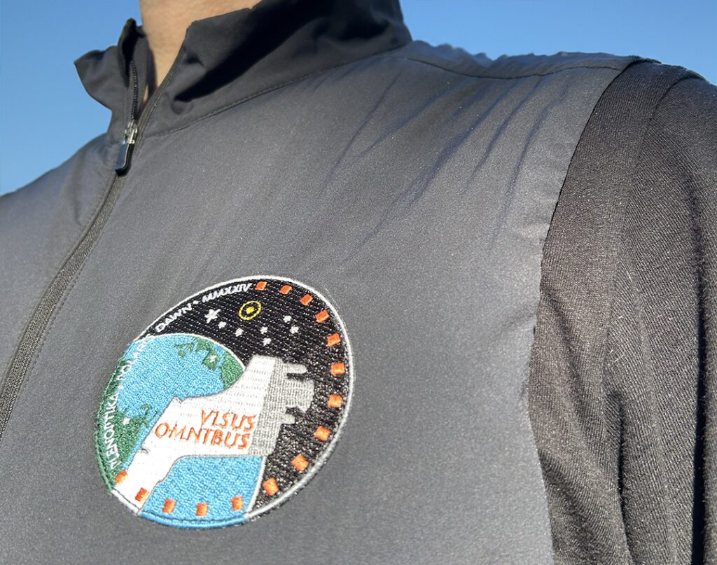 photograph of a space mission patch on a vest